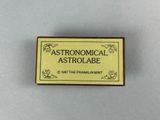 a small yellow and black sign that says astronomical astrolabe