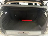 a trunk of a car with a red light in it