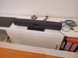 an image of a home theater system on a shelf