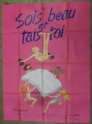 a pink poster with a picture of a woman doing a flip on a bed