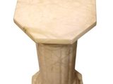 an image of a white marble table with a pedestal on top of it