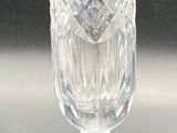 a clear glass cup sitting on top of a table