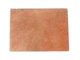 a close up of a piece of red clay on a white background