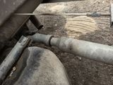 a close up of a pipe on the side of a truck