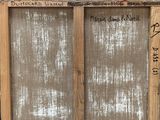 a picture of a window that has writing on it