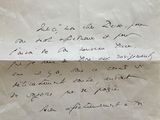a close up of a piece of paper with writing on it
