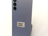 a close up of the back of a phone with a barcode on it
