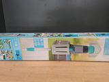 a box of nintendo wii game controllers on a table