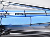 a blue bike with a handlebar attached to it
