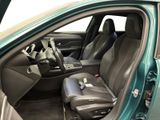 the interior of a car with the door open and the seat up