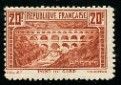 a stamp with a picture of a mountain scene on it