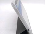 a tablet that is sitting on top of a stand