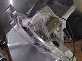 a silver machine that is sitting on top of a counter