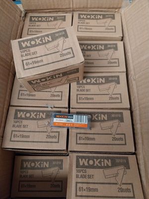 several boxes are stacked on top of each other in a room