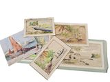many cards of different colors and designs on a table