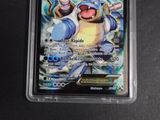 an image of a pokemon card in a plastic case