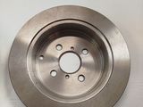a picture of a brake disc on a white surface