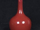 an image of a red vase on a black background