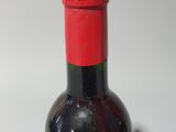 a bottle of wine that is sitting on a table