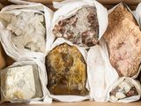 a box full of rocks and other rocks in it
