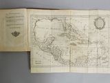 an open book with a map of the world on it