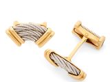 une paire de boutons de manchette en or et en argent, avec un motif torsadé
