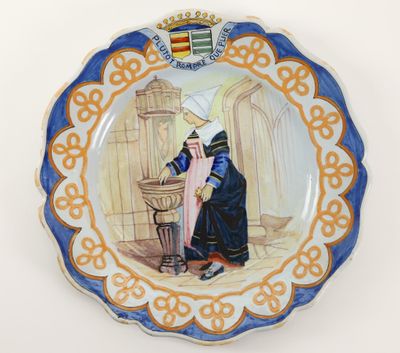 a plate with a picture of a woman on it