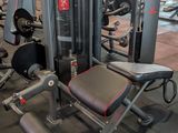 a gym with a lot of equipment in the room