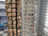 a display case with a lot of food inside of it