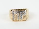 a close up of a gold ring with three diamonds on it