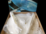 a box with a model of a star trek ship in it