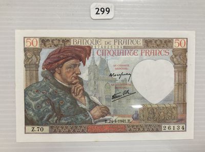 une image représentant un homme portant un turban rouge sur la tête