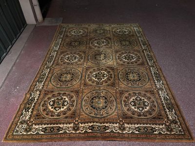 rug on the floor in front of a doorway with a door in the background