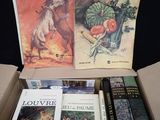 a box full of books that are sitting on a table