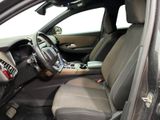 the interior of a car with a steering wheel and a dashboard