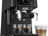 delong coffee machine with two cups of coffee next to it