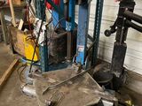 a picture of a machine that is sitting in a garage