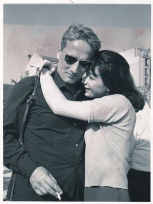 black and white photograph of a man and woman hugging each other