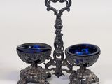 pair of antique silver plated candlesticks with blue glass bowls