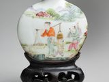 an image of a vase with a painting on it on a stand