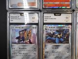 a lot of pokemon cards that are on the table