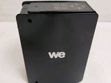 the back of a black box with a white we logo on it