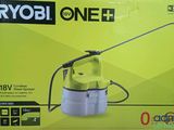 the box of a yellow and white power sprayer on a table