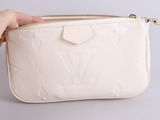 a person holding a white louis vuitton purse
