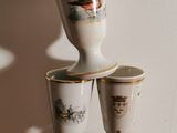 five cups stacked on top of each other on a table