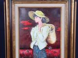 a painting of a woman in a straw hat on a easel