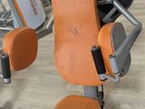 a machine that is sitting on a stand in a gym