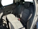the back seats of a car with a seat belt in the back of it