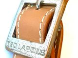 a close up of a belt with a buckle on it
