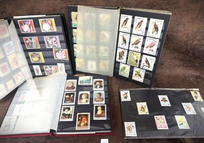 a lot of different stamps on the pages of a book